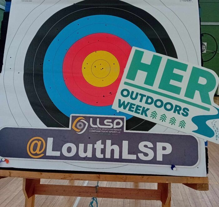 Archery board that has signage for Her Outdoors Week and Louth LSP.