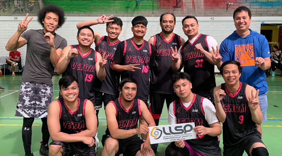 Group of men in basketball attire holding sign for LLSP.