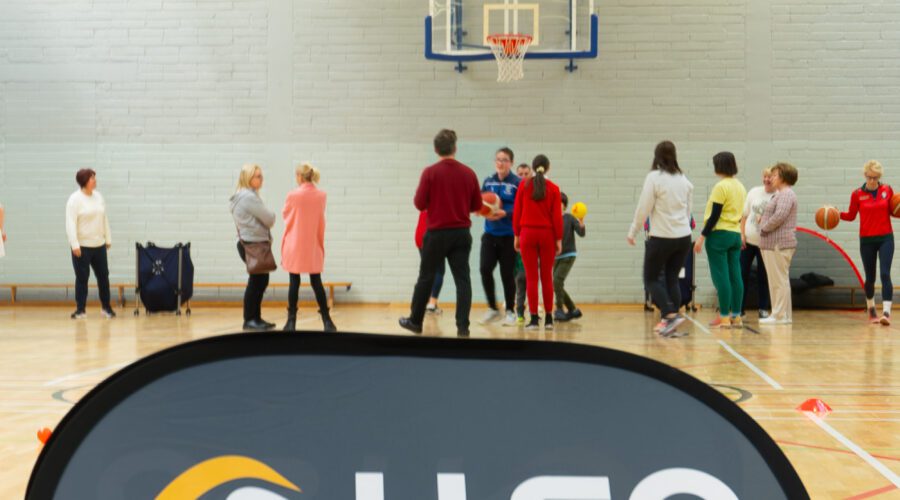 Signage for LLSP in gymnasium.