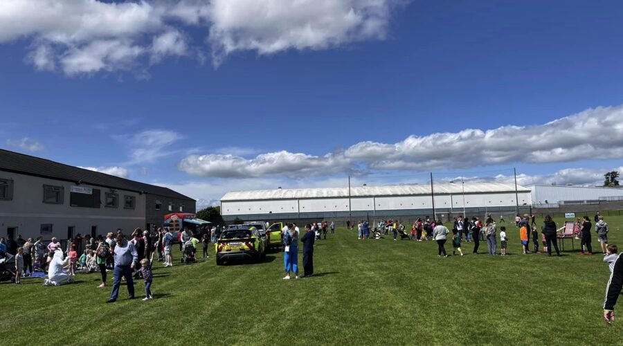 View of people on a hurling pitch.